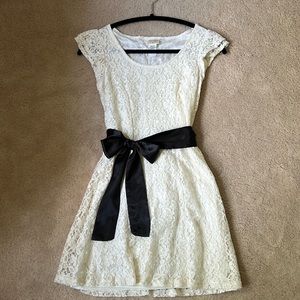 Women’s lace dress with black ribbon belt. Size S Small